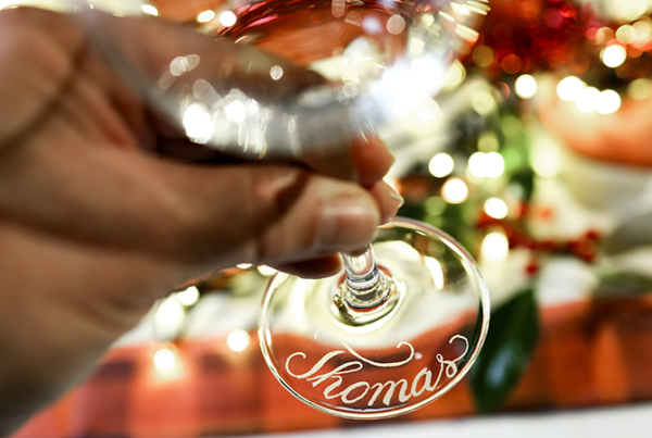 Special place card: engraved calligraphy on wine glass